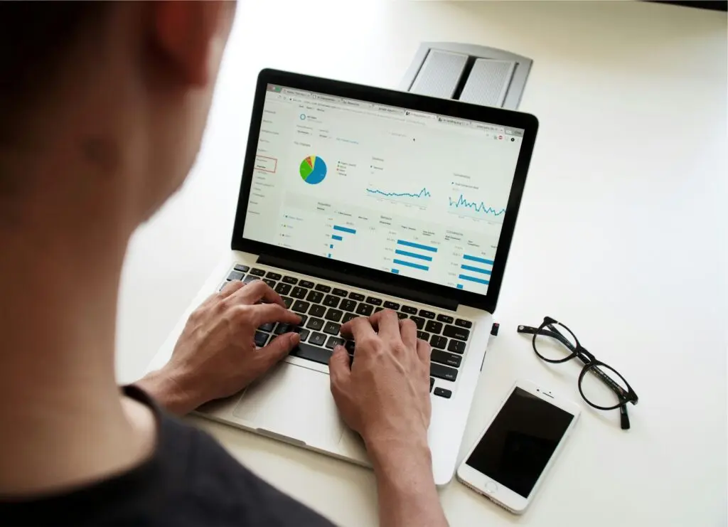 best digital marketing strategist in Kannur working in a laptop
